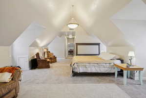 Bedroom with light carpet
