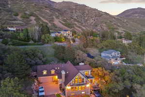 Aerial view at dusk of a mountain view and view of scattered trees