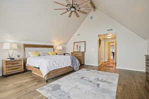 Bedroom featuring wood-type flooring and a ceiling fan