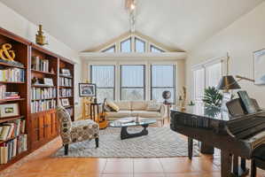 Living area with light tile patterned floors