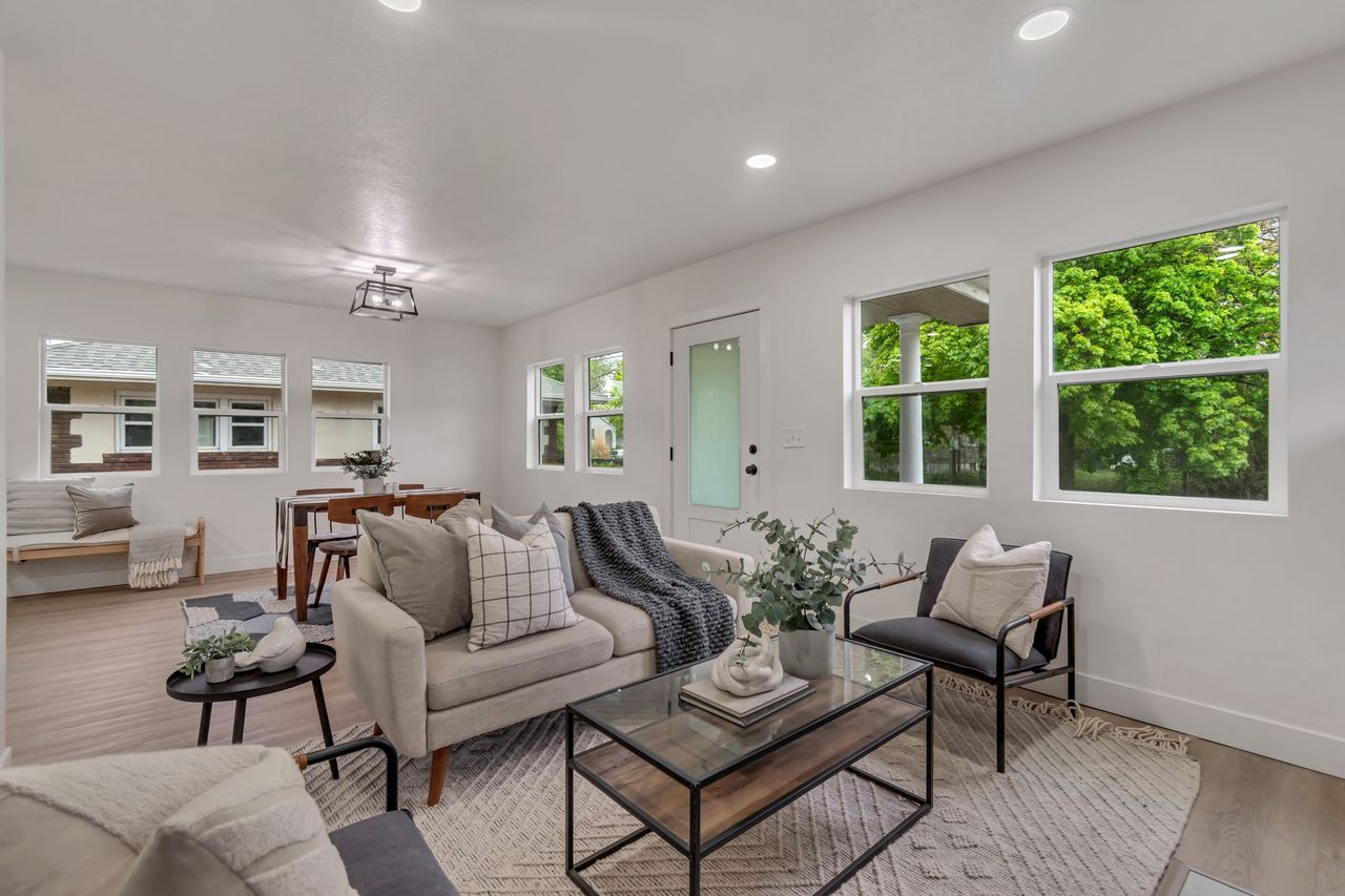 Living room featuring wood finished floors and recessed lighting