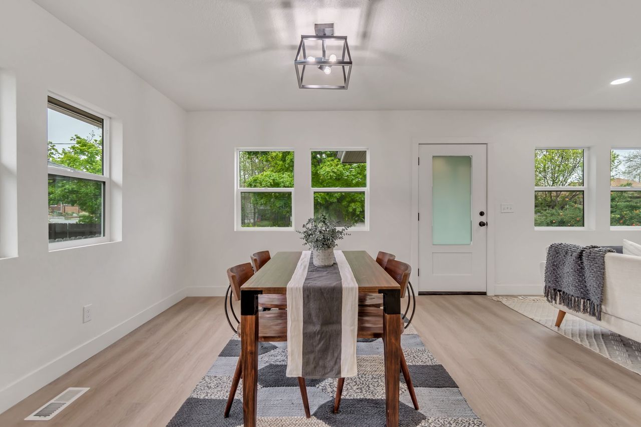 Dining area featuring light wood-style floors