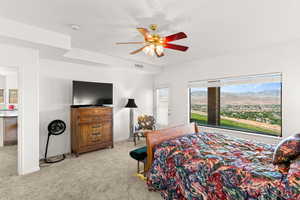 Bedroom with light carpet and ceiling fan