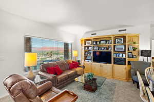 Living room featuring carpet floors