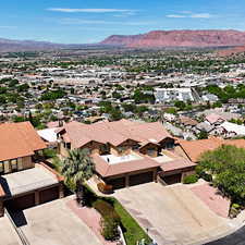 Aerial view of residential area featuring a mountain backdrop