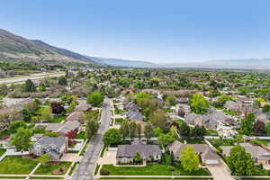 Aerial view of residential area with a mountain backdrop