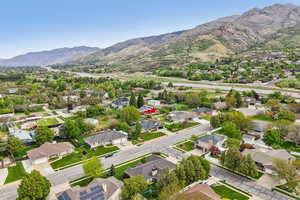 Aerial view of residential area with a mountainous background