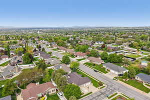 Aerial perspective of suburban area with a mountain backdrop