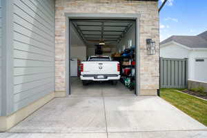 Garage featuring a garage door opener