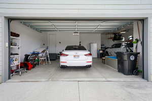 Garage with freestanding refrigerator
