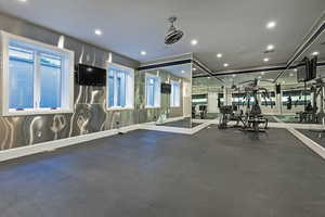 Gym featuring recessed lighting