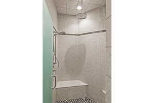 Bathroom featuring a shower stall