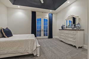 Carpeted bedroom featuring french doors, ceiling fan, access to exterior, and recessed lighting