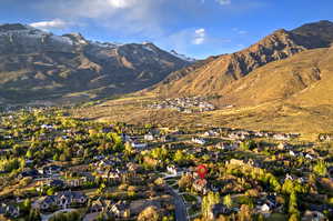 Aerial view of residential area featuring mountains