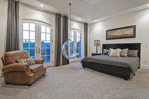 Carpeted bedroom featuring french doors, access to exterior, and recessed lighting