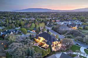 Aerial view at dusk of a residential view and a mountain view