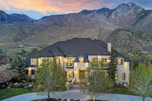 View of front of property featuring a chimney and a mountain view