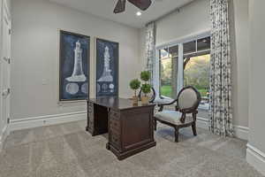 Office area with light colored carpet, recessed lighting, and a ceiling fan