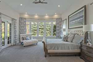Bedroom with access to exterior, carpet, vaulted ceiling, french doors, and a ceiling fan