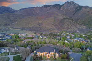 Aerial view at dusk of a mountain view and a residential view