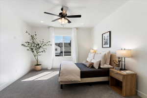 Bedroom with carpet and ceiling fan