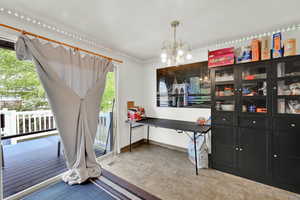 Dining area featuring suspended lighting