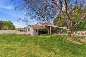 Back of property featuring a patio