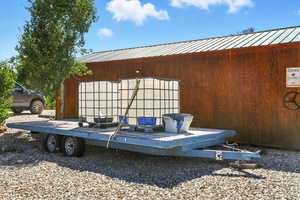 Included water hauling trailer