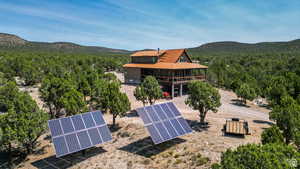 View from above of property featuring a mountainous background