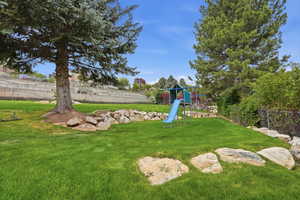 View of yard with a playground