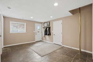 basement entrance foyer with firepole