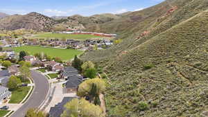Aerial view of residential area with a mountainous background