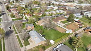 Aerial view of property's location featuring nearby suburban area