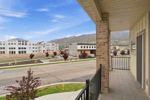 Balcony just off the living room featuring a mountain view