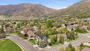 Aerial view of residential area with a mountain backdrop