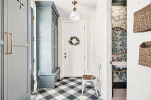 Foyer entrance featuring light floors