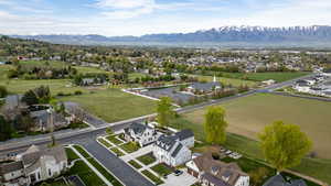 Aerial view of residential area featuring mountains