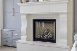 Detailed view of a glass covered fireplace