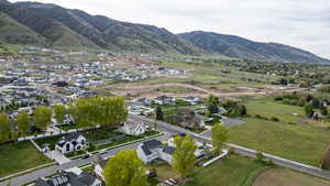 Aerial view of property's location with nearby suburban area