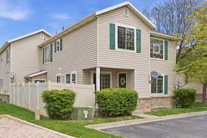 View of side of home featuring brick siding