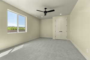 Unfurnished bedroom featuring light colored carpet, recessed lighting, and a ceiling fan
