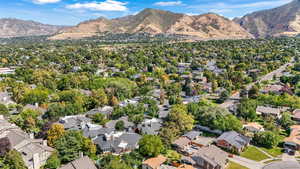 Aerial view of residential area featuring mountains