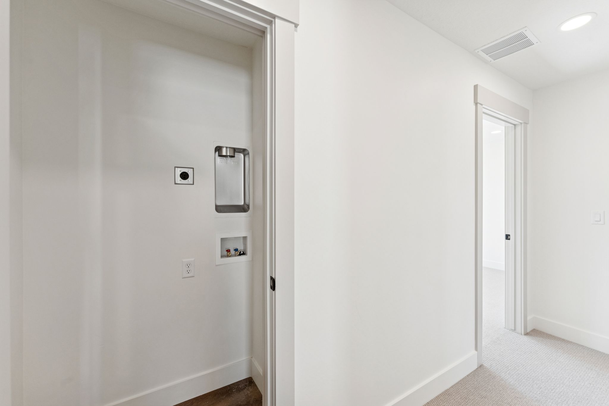 Hallway featuring carpet flooring and recessed lighting
