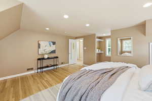 Bedroom featuring light wood finished floors and recessed lighting