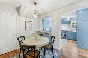 Dining space with light wood-style flooring