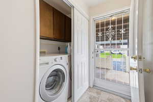 View from entrance hall towards patio/covered carport.