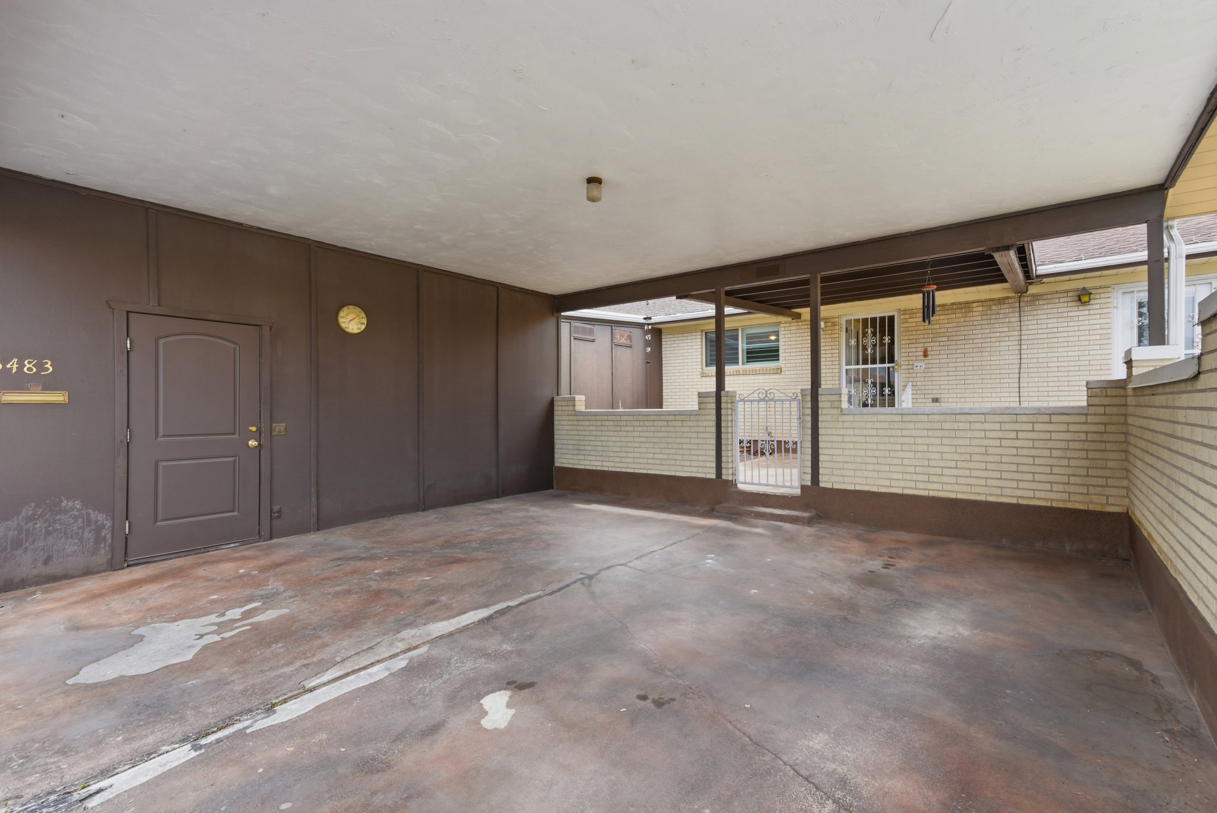 View of Covered Carport and Storage.
