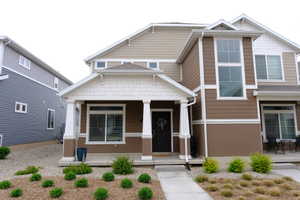 View of front of home featuring covered porch