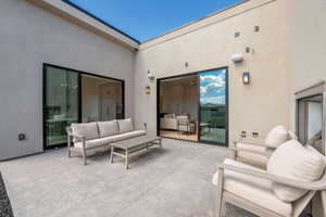 View of patio featuring outdoor furniture