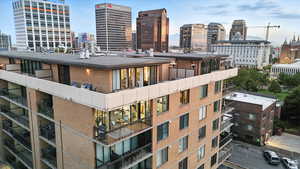 View of roof top deck with skyline view